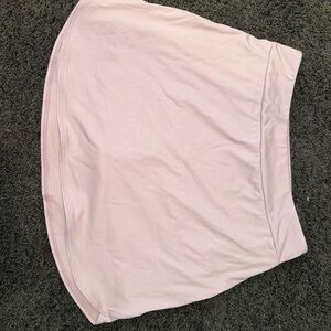 Pink Halara tennis skirt